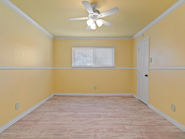 7931 Royal Ln Unit 115, Dallas, TX 75230 - empty room featuring crown molding, baseboards, a ceiling fan, and wood finished floors
