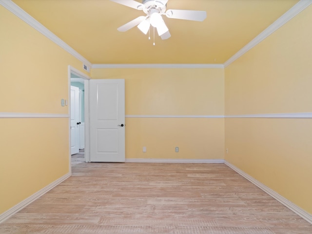 spare room with light hardwood / wood-style floors, ornamental molding, and ceiling fan