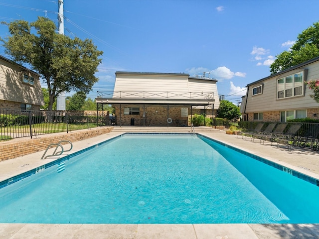 7931 Royal Ln Unit 115, Dallas, TX 75230 - pool with fence