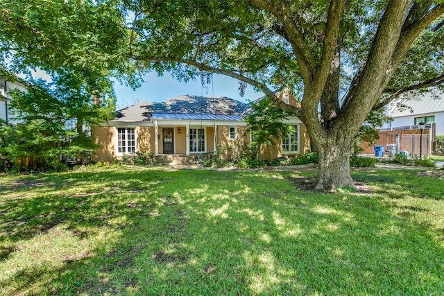 exterior space with a front yard