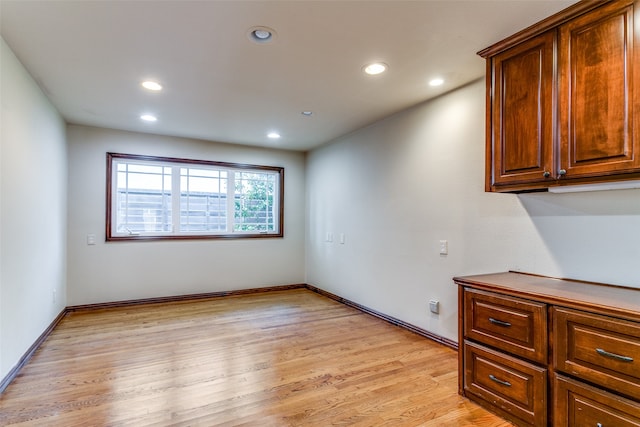 unfurnished room featuring light hardwood / wood-style floors