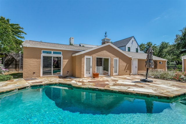 rear view of property with a patio