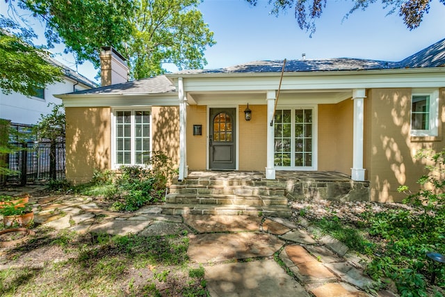 view of front of home featuring covered porch