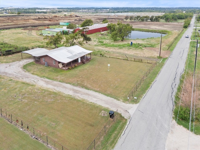 aerial view with a water view and a rural view