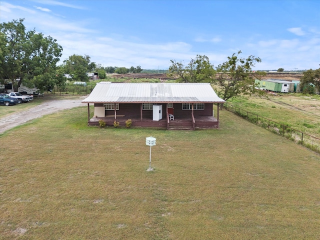 single story home with a front lawn