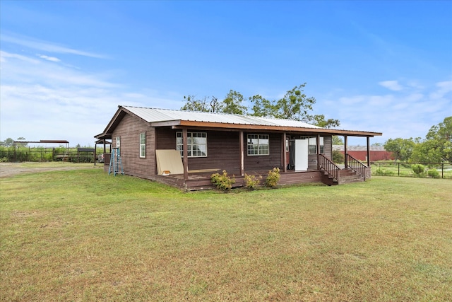 view of front of home with a front lawn