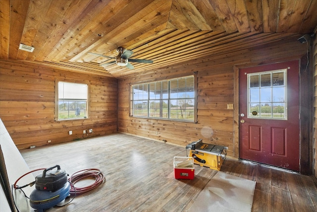 foyer entrance featuring ceiling fan, lofted ceiling, plenty of natural light, and wooden ceiling