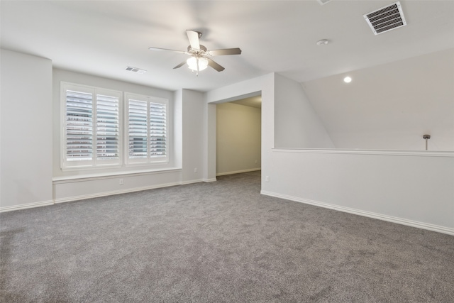 bonus room with lofted ceiling, ceiling fan, and carpet flooring