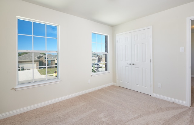 view of carpeted spare room