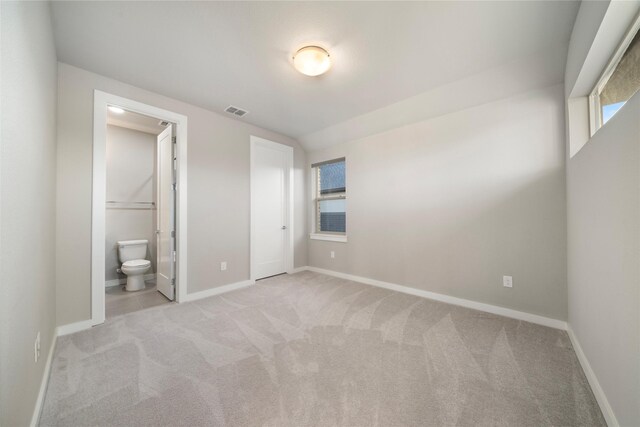 full bathroom featuring tile patterned flooring, shower / bath combination with curtain, vanity, and toilet