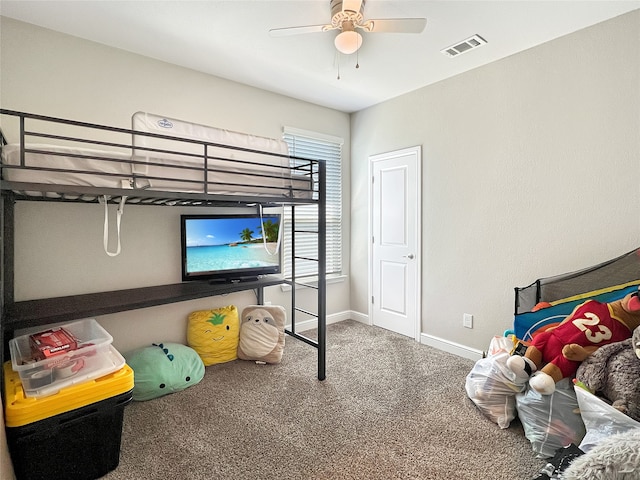 bedroom with ceiling fan and carpet flooring