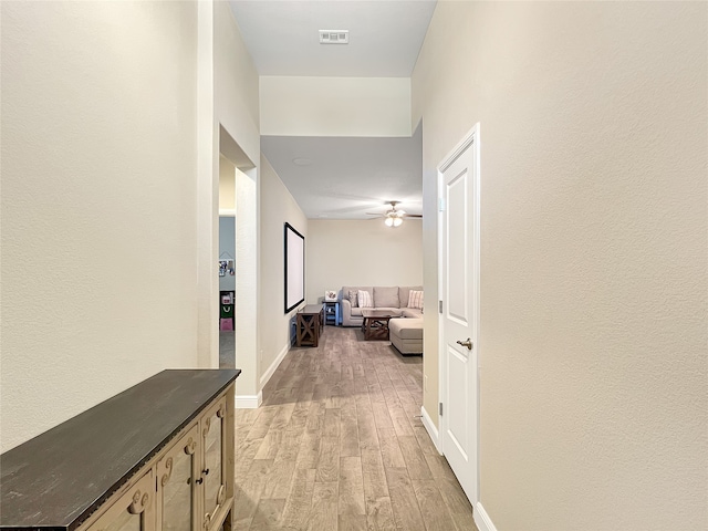 hallway featuring light wood-type flooring