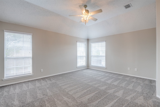 unfurnished room with a textured ceiling and ceiling fan