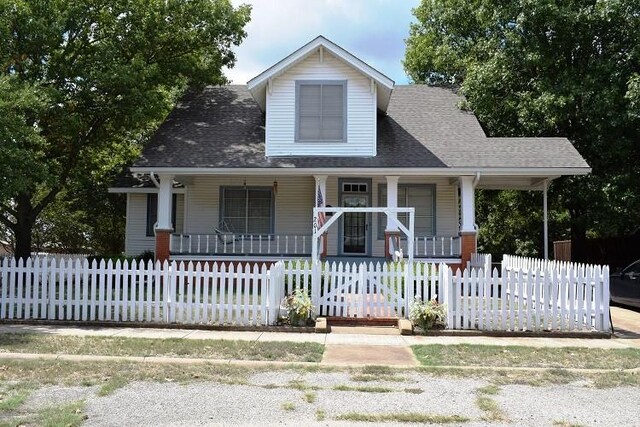 wooden terrace with covered porch