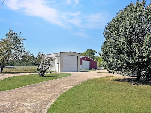 garage with a lawn