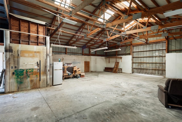 garage featuring white refrigerator