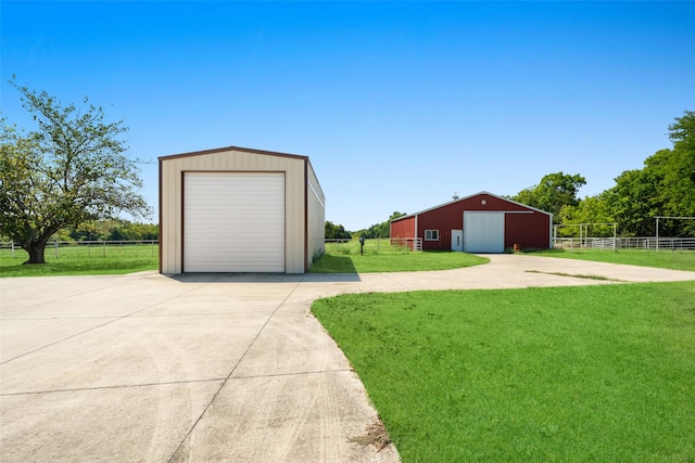 garage with a lawn