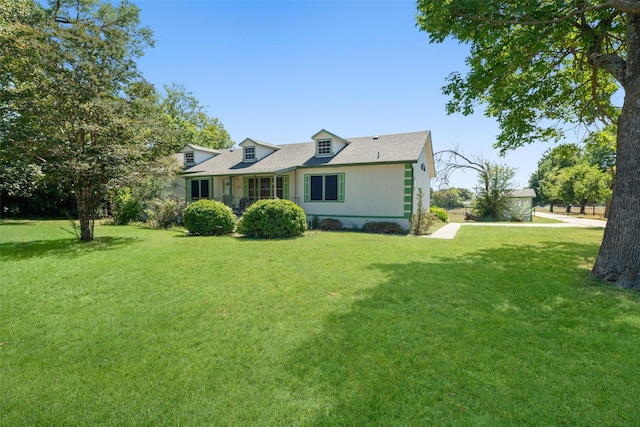 view of front of home with a front yard