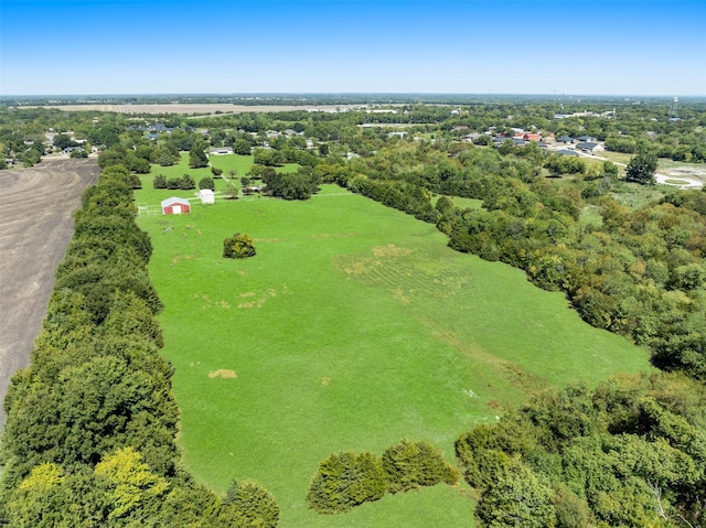 birds eye view of property featuring a rural view