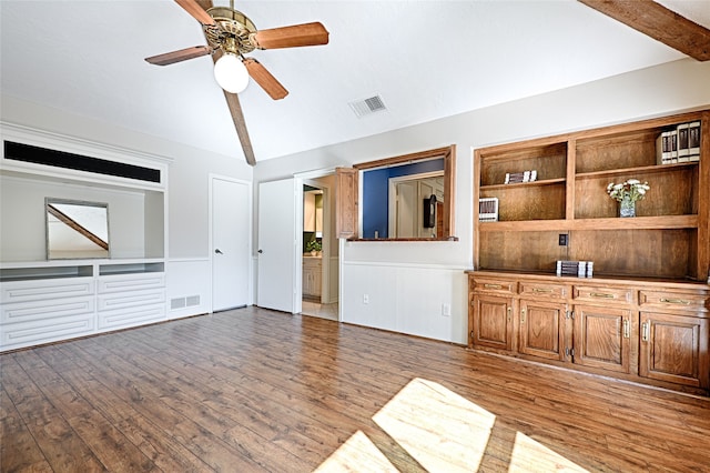 unfurnished living room featuring lofted ceiling with beams, ceiling fan, and dark hardwood / wood-style flooring