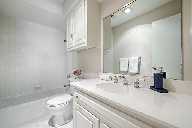 full bathroom featuring toilet, tiled shower / bath combo, vanity, and tile patterned flooring