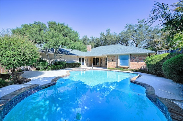 view of pool featuring a patio area