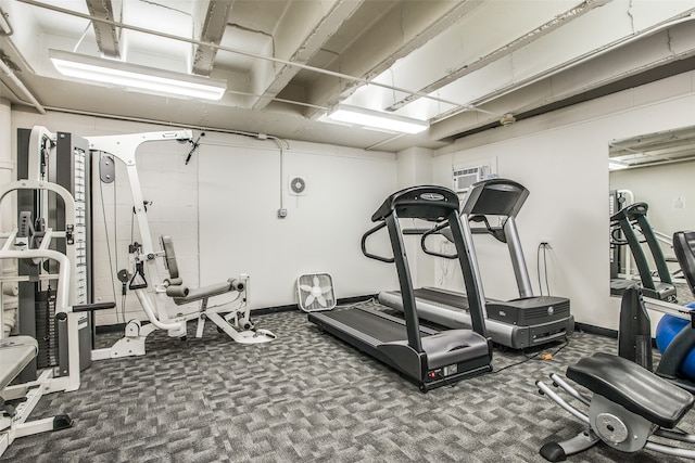 workout area featuring carpet flooring