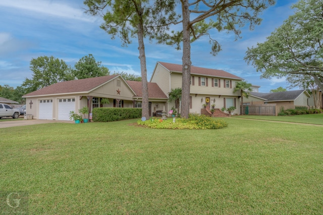 view of front facade featuring a front yard and a garage