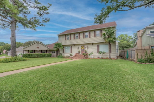 view of front of home with a front yard