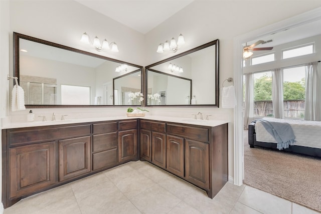 bathroom featuring ceiling fan, tile patterned floors, and vanity