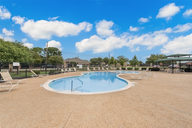 view of pool featuring a gazebo and a patio