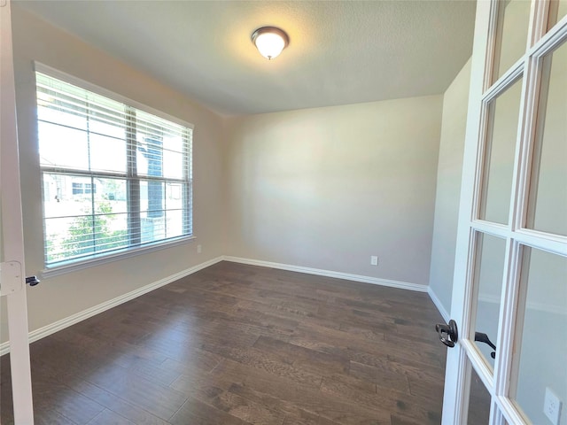 1516 Fairweather Way, Forney, TX 75126 - unfurnished room featuring dark wood-style floors and baseboards