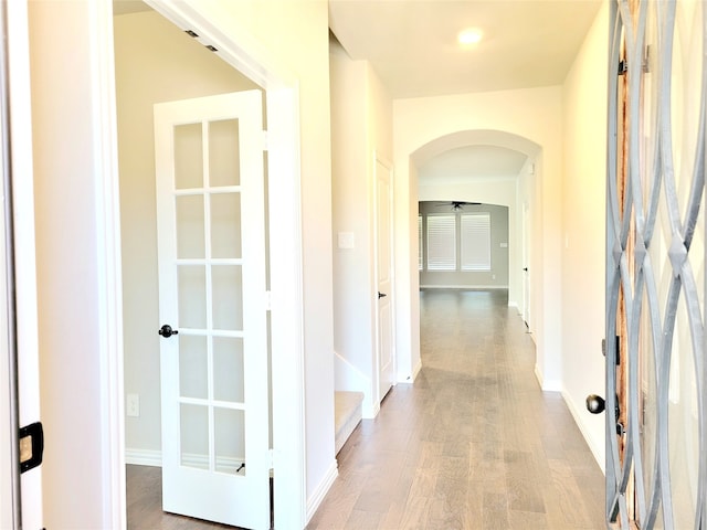 corridor featuring light hardwood / wood-style flooring