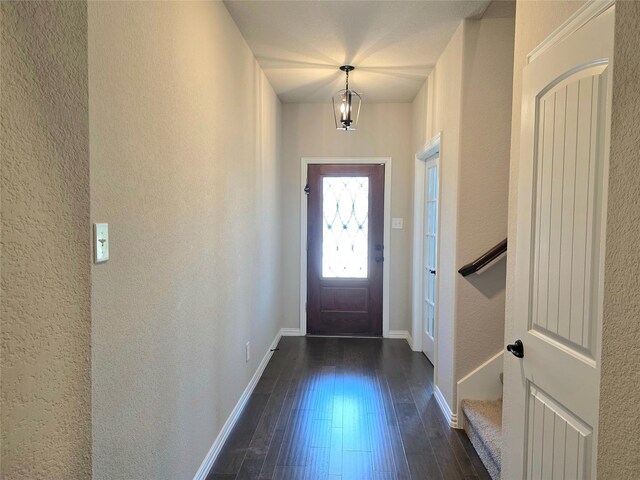 1516 Fairweather Way, Forney, TX 75126 - entrance foyer with dark wood-style floors and a textured wall