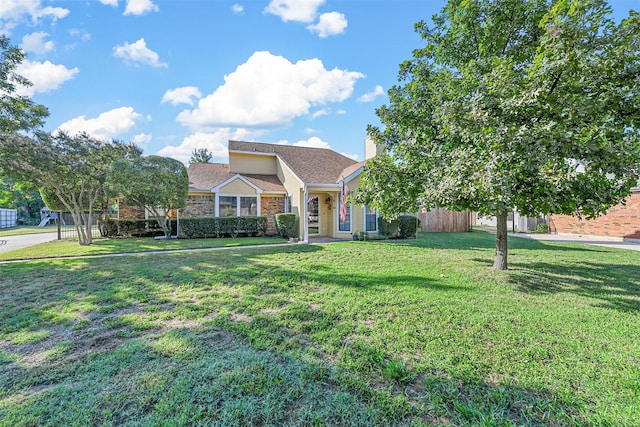 view of front of home with a front lawn