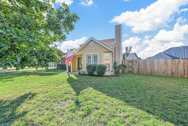 view of front of house with a front lawn