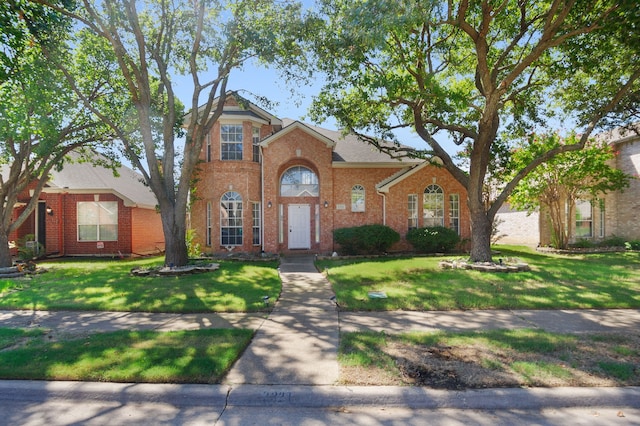 view of front of home featuring a front yard