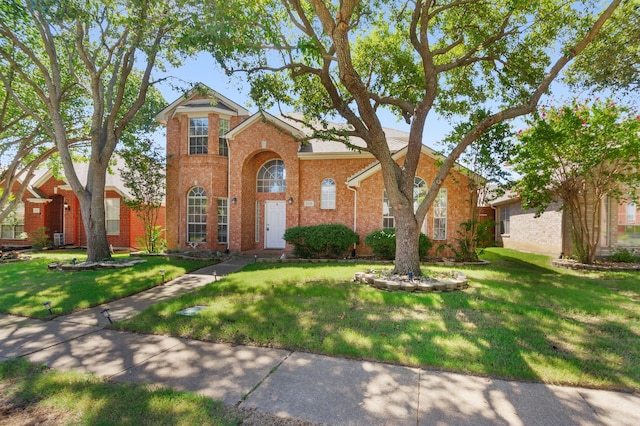 view of front of home with a front yard