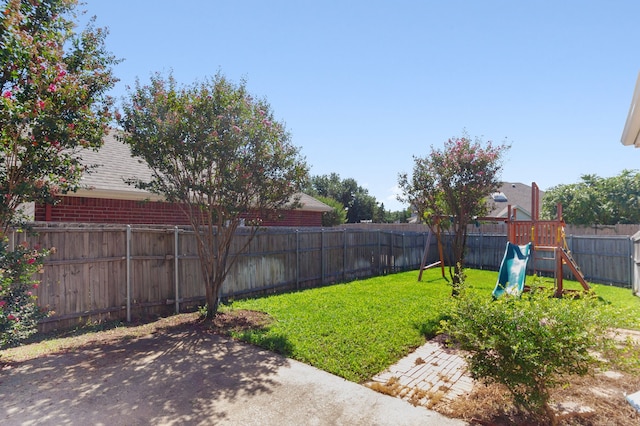 view of yard with a playground