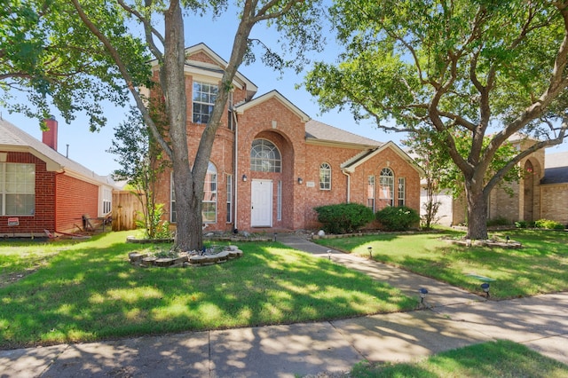 view of property with a front lawn