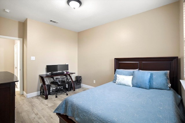 bedroom featuring light hardwood / wood-style floors