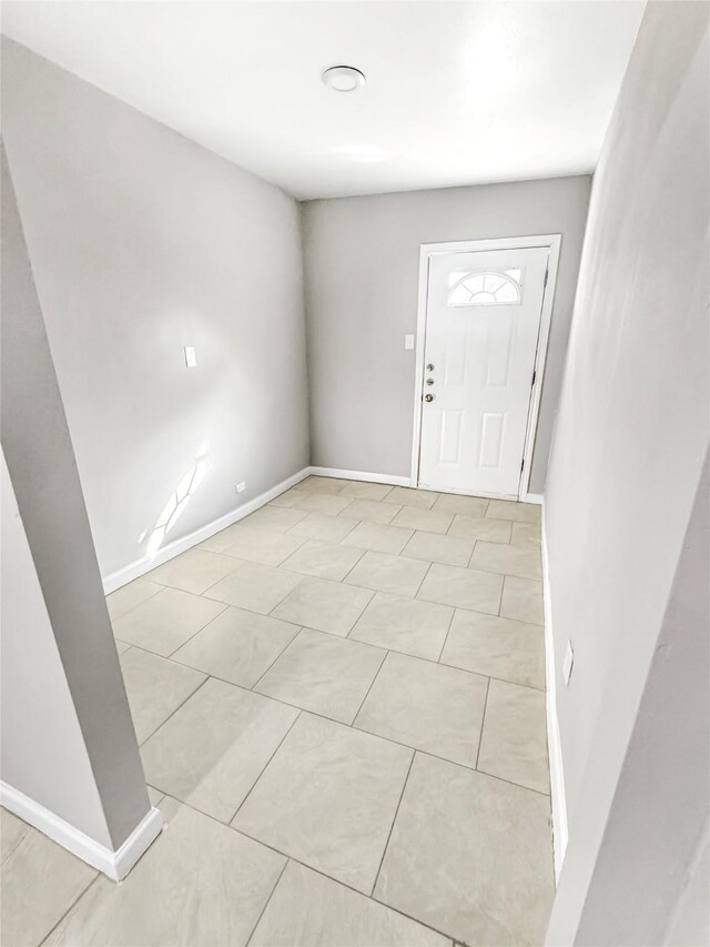 foyer with ceiling fan and hardwood / wood-style floors