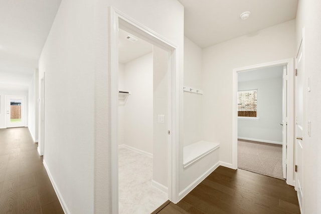 corridor featuring hardwood / wood-style flooring