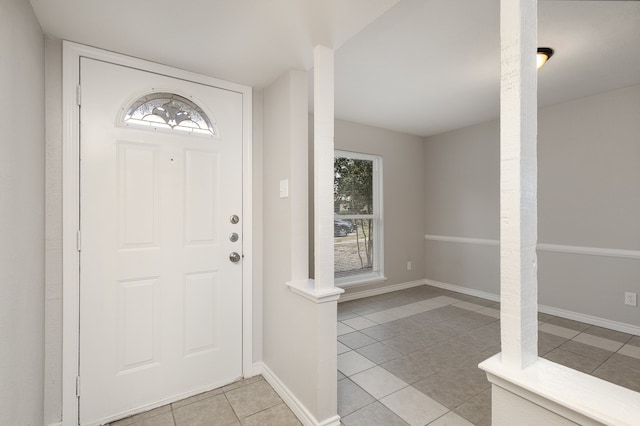 foyer with light tile patterned flooring