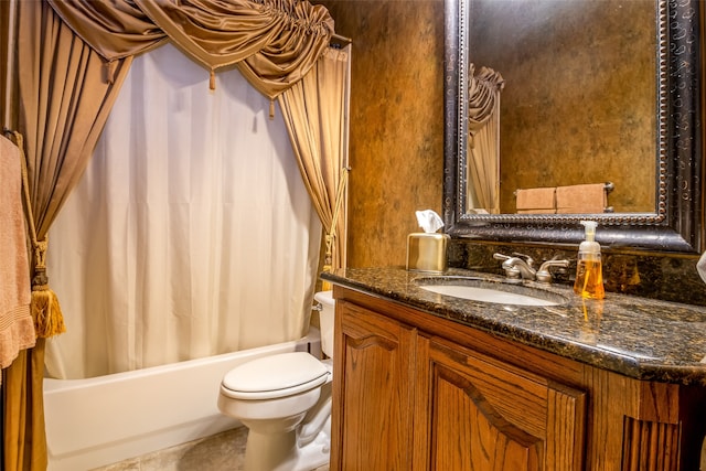 full bathroom featuring vanity, toilet, shower / bath combo with shower curtain, and tile patterned floors