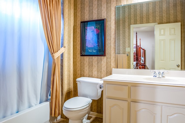 full bathroom with shower / tub combo with curtain, vanity, and toilet