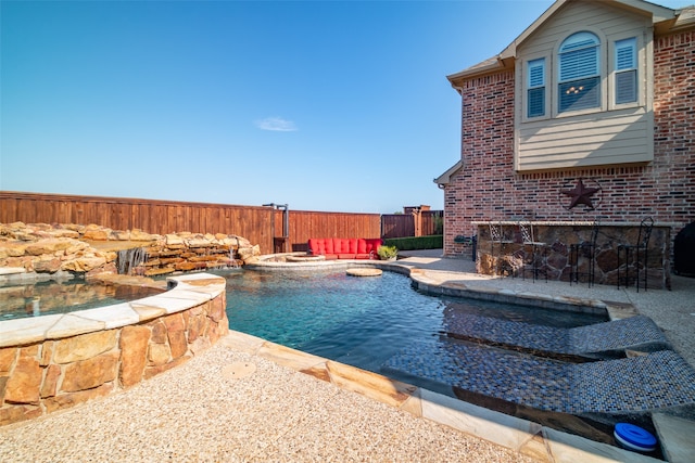 view of pool featuring a patio area