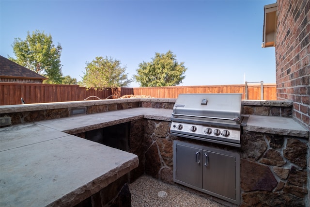 view of patio with area for grilling