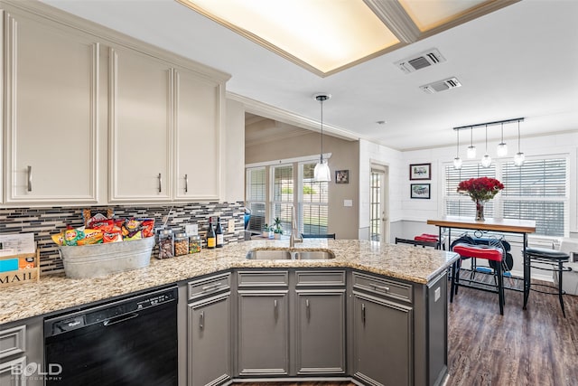 kitchen with gray cabinetry, black dishwasher, kitchen peninsula, dark hardwood / wood-style flooring, and decorative light fixtures