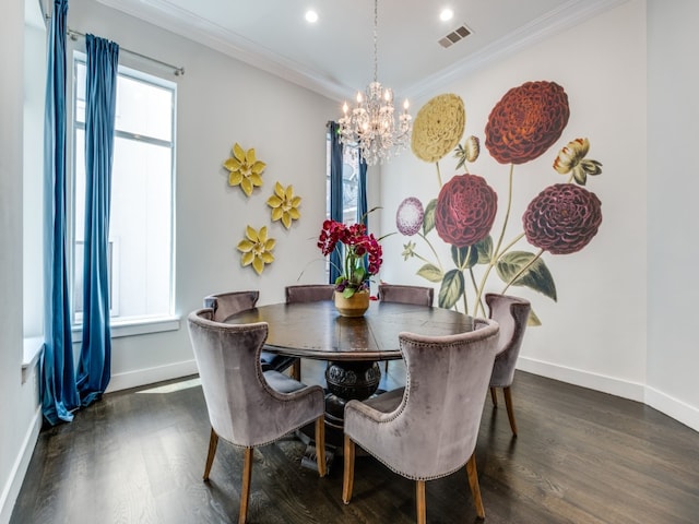 dining area with a chandelier, dark wood-type flooring, and crown molding